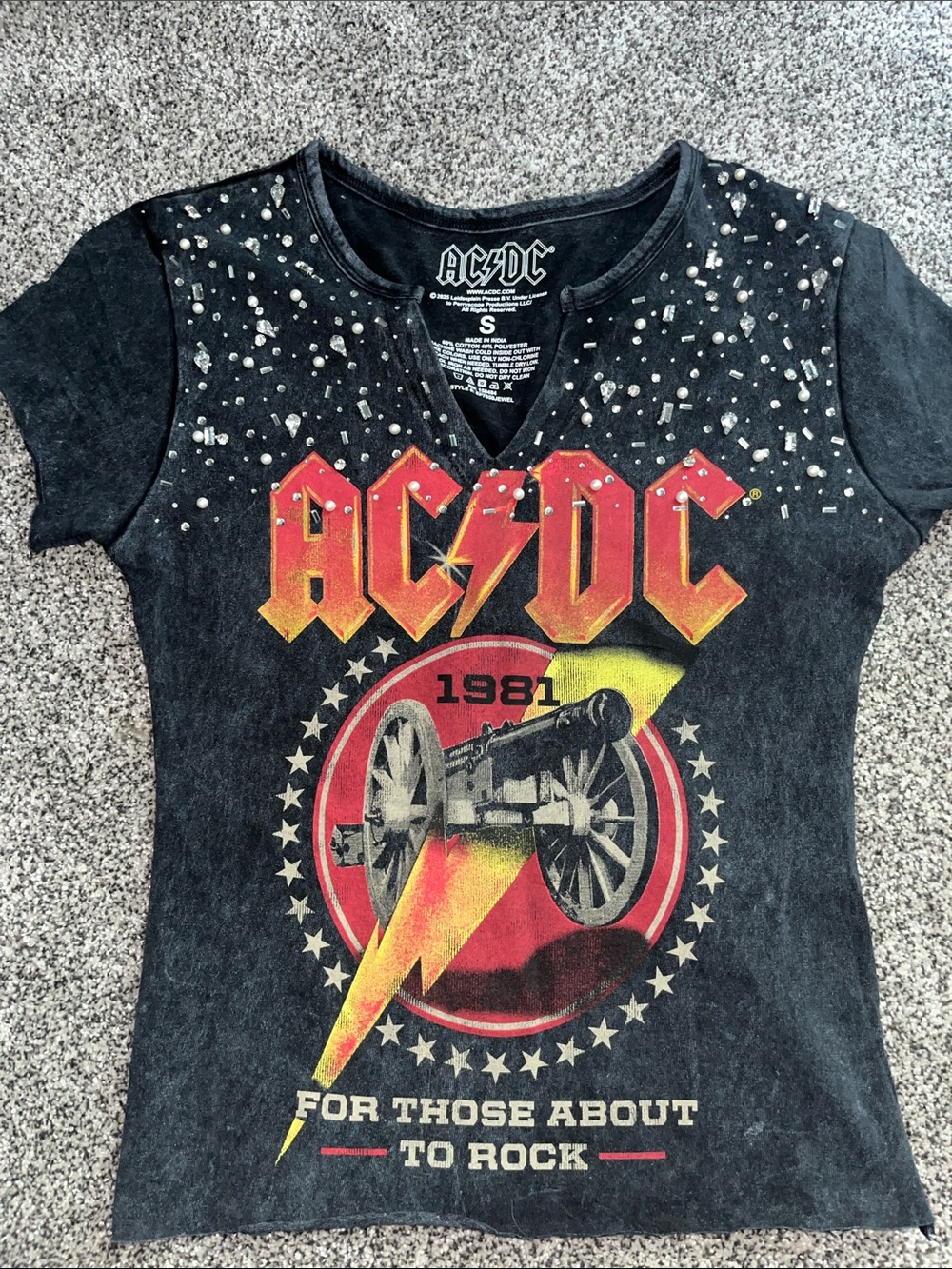 Brand new Women’s Graphic Tee with Red and Yellow band logo and rhinestones